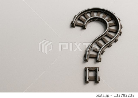 Railway rails in the form of a question. Space for text. Railway rails in the form of a question. Space for text. 132792238