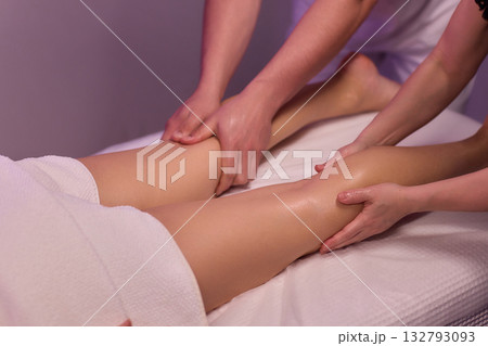 Enjoy a Relaxing Leg Massage Therapy Session for Wellness and Relaxation at the Spa 132793093