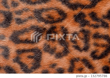 Dark leopard faux fur macro photo as a background. 132795786