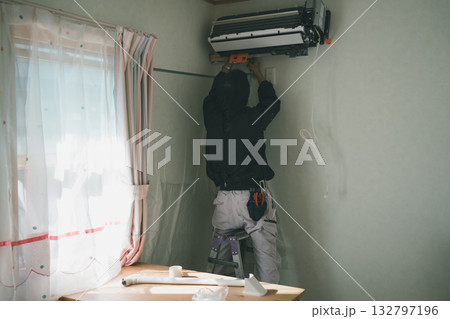 installation of an air conditioner installation of an air conditioner 132797196