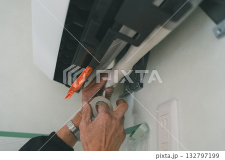 installation of an air conditioner installation of an air conditioner 132797199