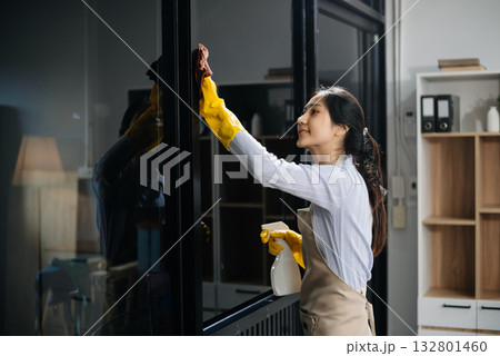 Efficient and professional housekeeping with our dynamic cleaning duo. Perfect teamwork ensures spotless cleanliness 132801460