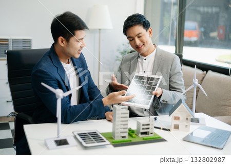 ESG concept of environmental, Green ethical business preserving resources, reducing CO2, Business person team working on laptop virtual smartphone 132802987