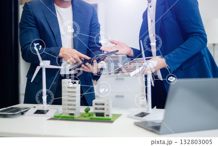 Business team working virtual modern smartphone to reduce CO2 emissions carbon footprint climate change to limit global warming.Sustainable development 132803005