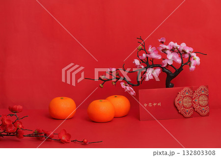 Festive Background with Oranges and Red Envelopes for Lunar New Year Festive Background with Oranges and Red Envelopes for Lunar New Year 132803308