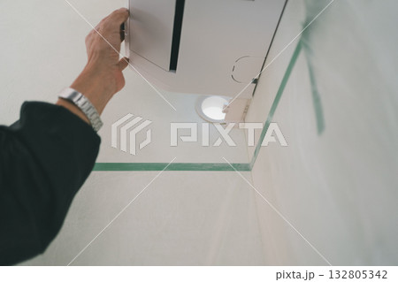 installation of an air conditioner installation of an air conditioner 132805342