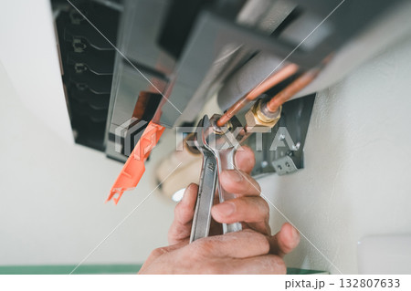 installation of an air conditioner installation of an air conditioner 132807633