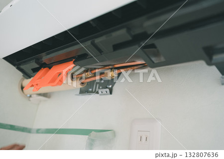installation of an air conditioner installation of an air conditioner 132807636
