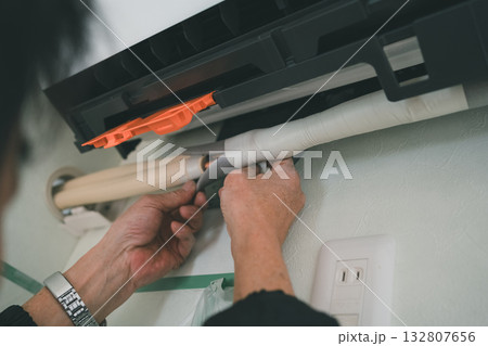 installation of an air conditioner installation of an air conditioner 132807656