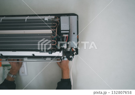 installation of an air conditioner installation of an air conditioner 132807658