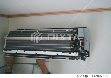 installation of an air conditioner installation of an air conditioner 132807659