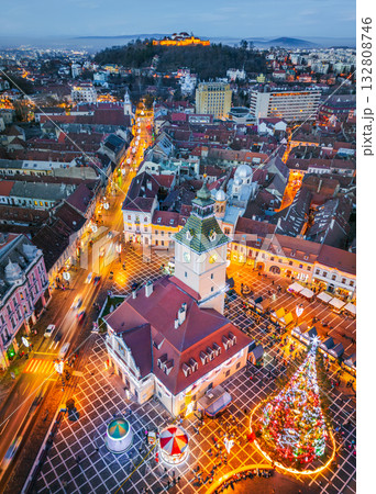 Brasov, Romania. Christmas Market, twilight beautiful lights, aerial drone view with Main Square, Transylvania holiday destination. 132808746