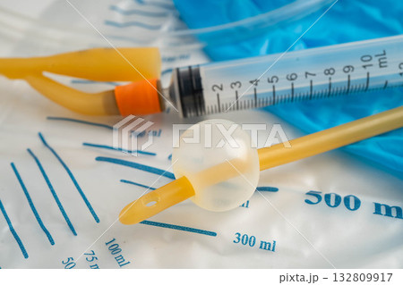 Foley catheter and urine drainage bag collect urine for disability or patient in hospital. 132809917
