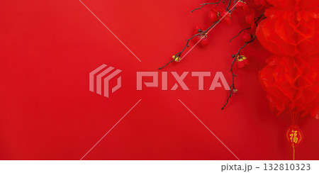 Chinese New Year Celebration. Red background with decorative elements symbolizing prosperity. Chinese New Year Celebration. Red background with decorative elements symbolizing prosperity. 132810323