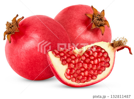 Pomegranate fruits and a cut in a slice isolated. 132811487