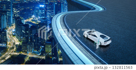 3d rendering electric car charging on futuristic rooftop road overlooking city 132811563