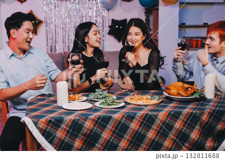 Diversity, dinner and group of people toast celebration together at party. Friends, happy and celebrate with food, wine and friendship for love, support and cheers champagne at business function 132811688