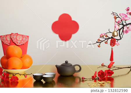Chinese New Year Celebration with Tea Set and Oranges 132812590