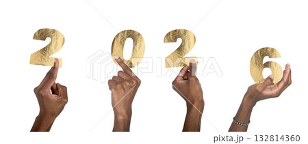 2026 New Year celebration. Black-skinned male hand holding golden metallic numbers with shiny 132814360