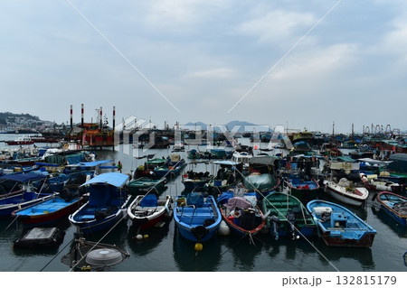 The view of Cheung Chau pier. Boats in Cheung Chau, Hong Kong. Travel and nature scene. 132815179