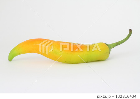 yellow and green pepper on a white background 132816434