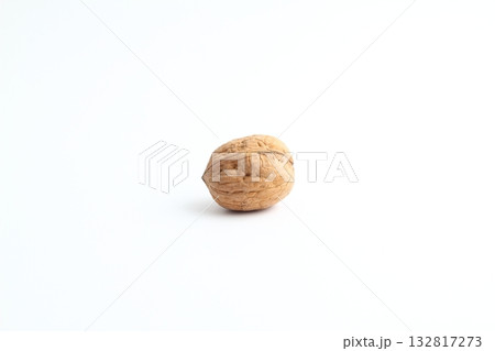 Walnut on the white background. Close up shot of whole walnut isolated on white background. 132817273