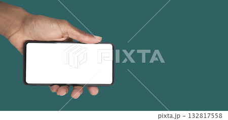 Modern phone mockup in human hand, empty display for mobile app presentation or web marketing 132817558