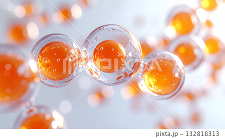 ビタミンC美容成分の分子イメージ オレンジ色の液体球体が浮遊する抽象的な背景 3D化粧品広告用 132818313