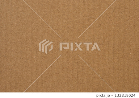 Textured brown cardboard paper surface with natural fibers visible Textured brown cardboard paper surface with natural fibers visible 132819024