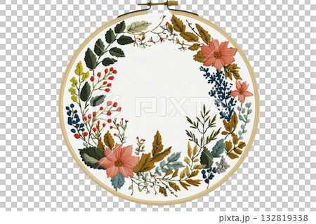 A circular embroidery hoop featuring a floral wreath design with colorful leaves and flowers on a light background. 132819338
