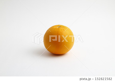 Single ripe whole orange citrus fruit with shadow isolated on white background. Single ripe whole orange citrus fruit with shadow isolated on white background. 132821582