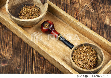 Smoking pipe and tobacco. Smoking pipe and tobacco. 132822507