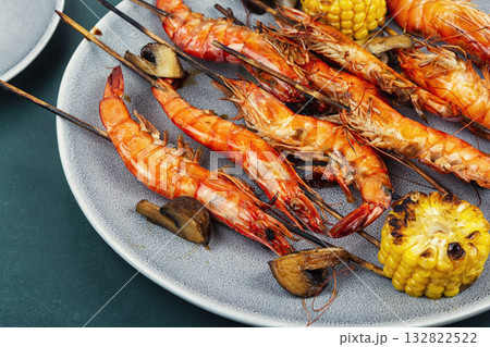 Grilled shrimp skewers and langoustines. Grilled shrimp skewers and langoustines. 132822522