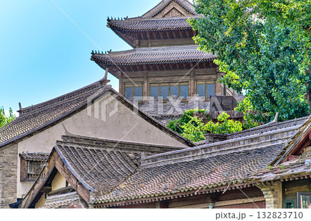 The ancient water town of Gubei near the site of the Great Wall of Simatai on a clear summer day. 132823710