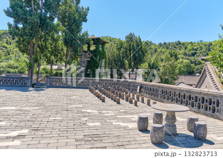 The ancient water town of Gubei near the site of the Great Wall of Simatai on a clear summer day. The ancient water town of Gubei near the site of the Great Wall of Simatai on a clear summer day. 132823713