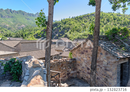 The ancient water town of Gubei near the site of the Great Wall of Simatai on a clear summer day. The ancient water town of Gubei near the site of the Great Wall of Simatai on a clear summer day. 132823716