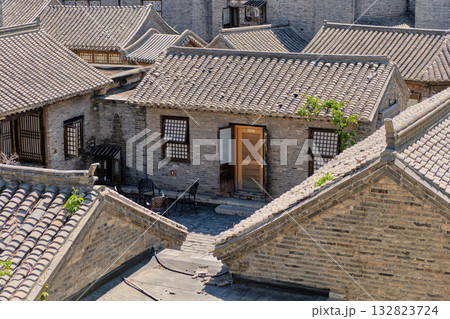 The ancient water town of Gubei near the site of the Great Wall of Simatai on a clear summer day. 132823724
