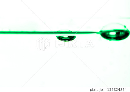 198.Green Liquid with Submerged Air Bubbles in Glass 132824854