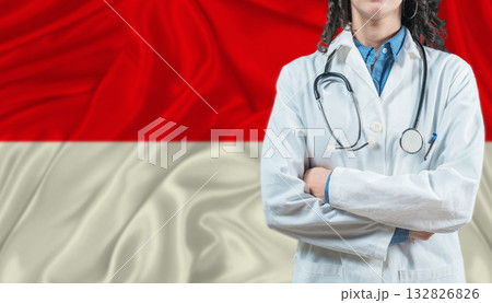 Medical professional on Indonesia flag. Healthcare and wellness in Indonesia, Concept Medical professional on Indonesia flag. Healthcare and wellness in Indonesia, Concept 132826826