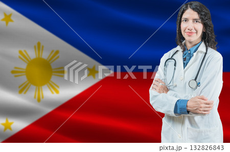 Filipino medicine and healthcare concept. Close up of doctor against Philippine flag background 132826843