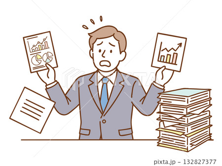 仕事に追われて困惑するビジネスマン 132827377