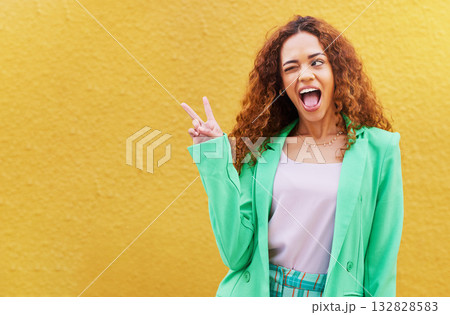 Woman, peace and wink on yellow background, color backdrop and mockup space. Happy female, v sign and hands of cool model for victory, winking and fun mood with happiness, mock up and gen z fashion Woman, peace and wink on yellow background, color backdrop and mockup space. Happy female, v sign and hands of cool model for victory, winking and fun mood with happiness, mock up and gen z fashion 132828583