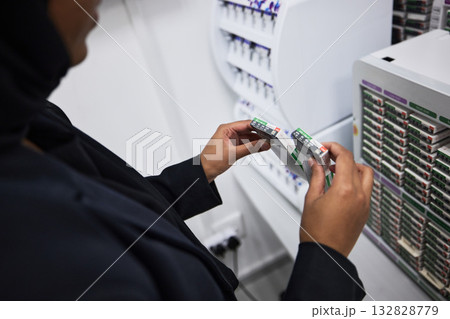 Optometrist, hands and box, medical choice for vision, eye care or contact lens in hospital stock room. Muslim black woman, healthcare career and product for wellness, optometry or decision in clinic Optometrist, hands and box, medical choice for vision, eye care or contact lens in hospital stock room. Muslim black woman, healthcare career and product for wellness, optometry or decision in clinic 132828779