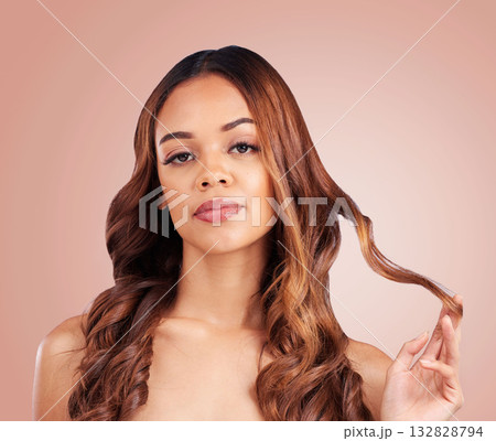 Face, hair care and beauty portrait of woman in studio isolated on a pink background. Aesthetics, cosmetics and female model with salon treatment for balayage, growth and texture for curly hairstyle. 132828794
