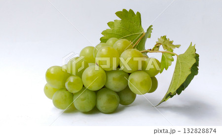 Fresh green grapes with leaves on white background 132828874