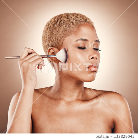 Makeup, brush and woman, face and beauty with cosmetic care, glow and cosmetology on studio background. Foundation, powder and cosmetics tools and product with hand, skincare with zen and eyes closed Makeup, brush and woman, face and beauty with cosmetic care, glow and cosmetology on studio background. Foundation, powder and cosmetics tools and product with hand, skincare with zen and eyes closed 132829043