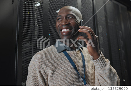 Server, phone call and man for system update, electrician networking power or cyber security backup success. Person, african engineer or technician information technology on smartphone communication Server, phone call and man for system update, electrician networking power or cyber security backup success. Person, african engineer or technician information technology on smartphone communication 132829090