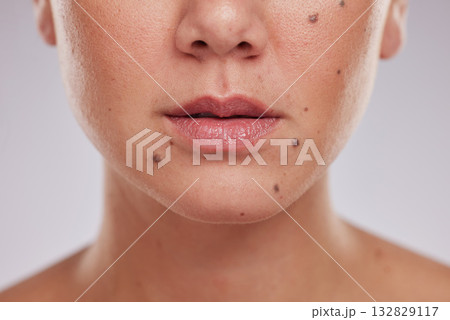 Lips, mouth and woman, face and beauty with closeup, skincare and lip filler with collagen on studio background. Skin, dermatology and cosmetic care with wellness, natural cosmetics and cosmetology 132829117