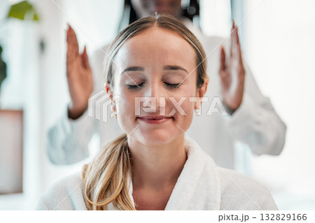Relax, reiki and woman with smile on face at spa for spiritual chakra therapy and alternative medicine. Healing, balance and zen, person with peaceful mindset and healthy mind at traditional massage. 132829166