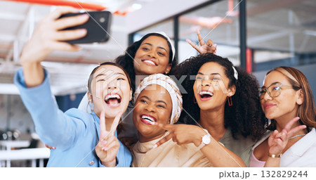 Happy business people, peace or selfie in office for a fun memory, profile picture or social media post. Smile, teamwork or group of women friends or coworkers taking pictures on a break to relax Happy business people, peace or selfie in office for a fun memory, profile picture or social media post. Smile, teamwork or group of women friends or coworkers taking pictures on a break to relax 132829244